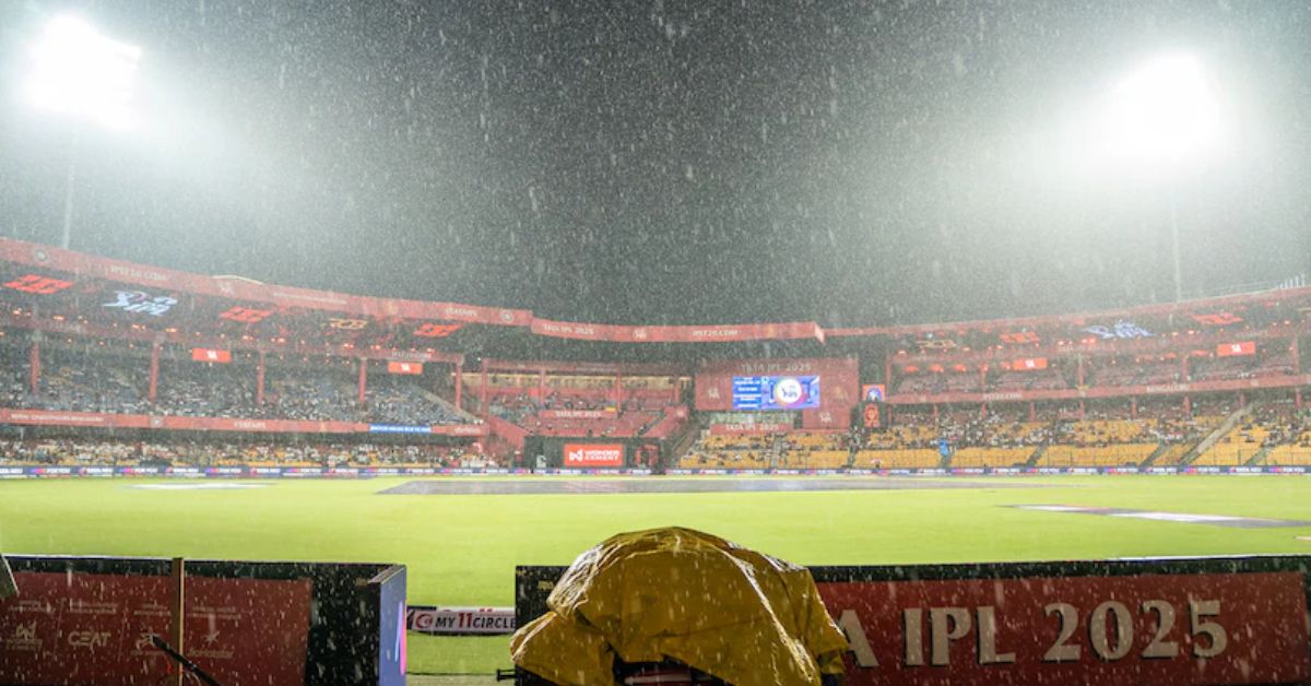 Rain covers at M. Chinnaswamy Stadium delaying IPL 2025 RCB vs KKR match